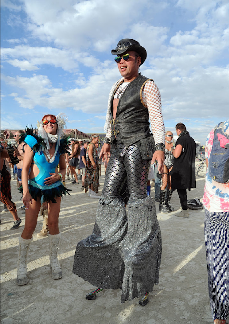 burners-who-wanted-even-more-height-brought-stilts-and-pants-long-enough-to-cover-them