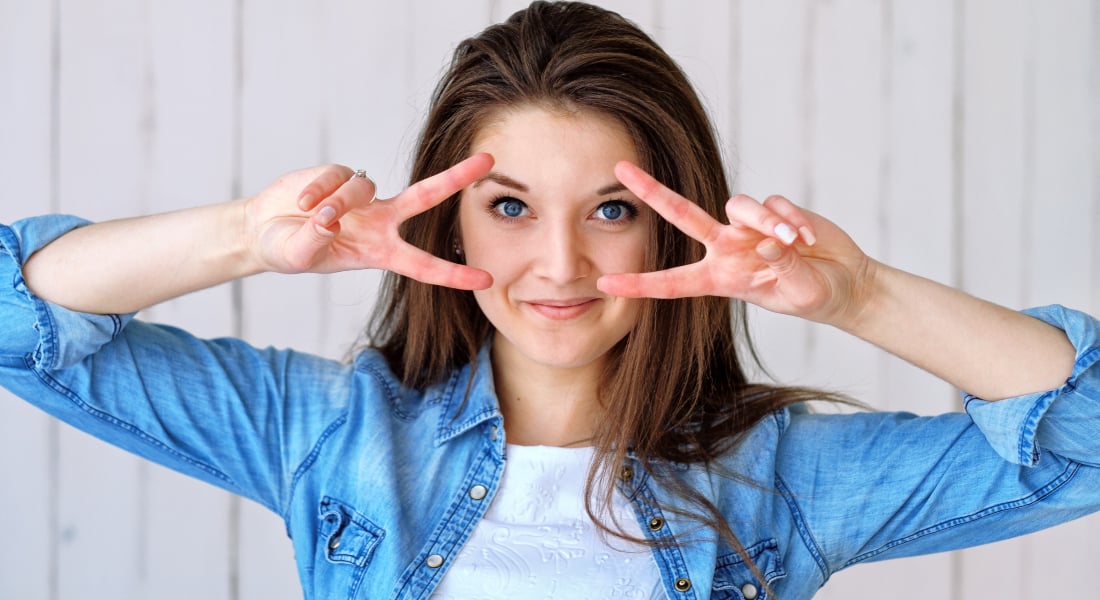 žena