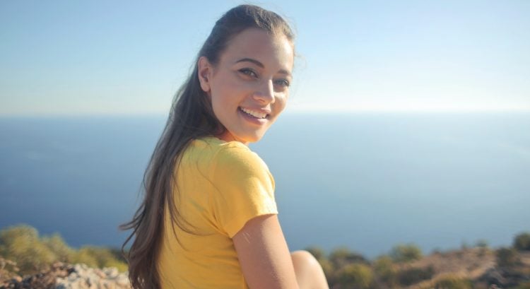 žena