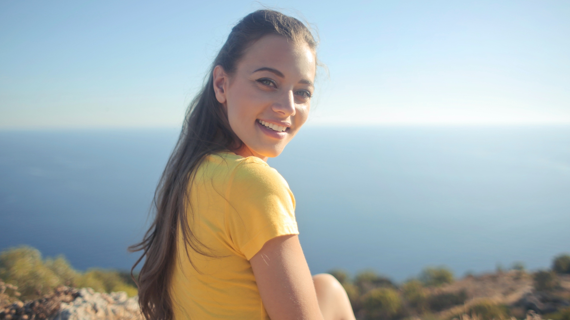žena