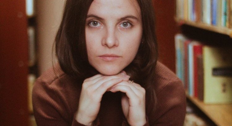 žena