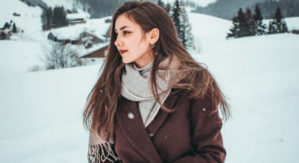 žena