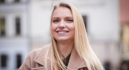 žena