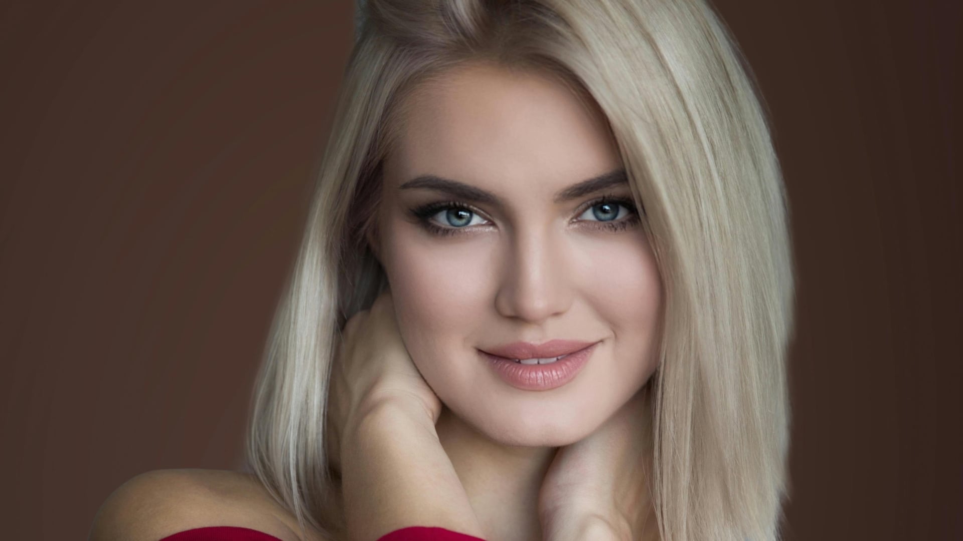 žena