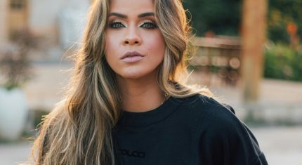 žena