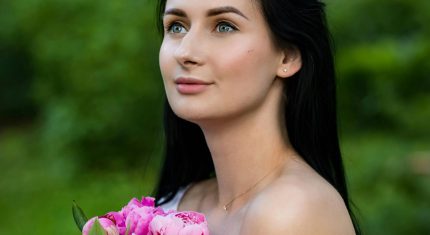 žena