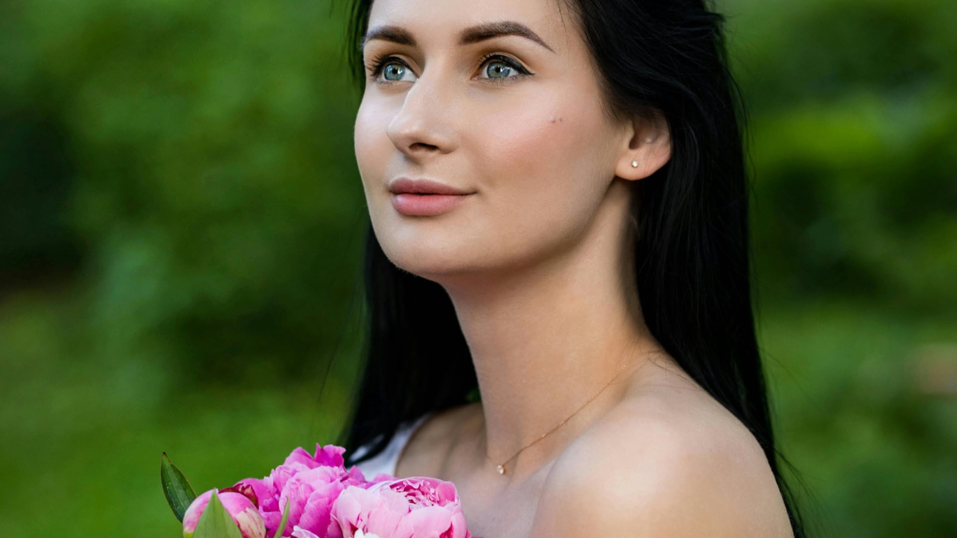 žena